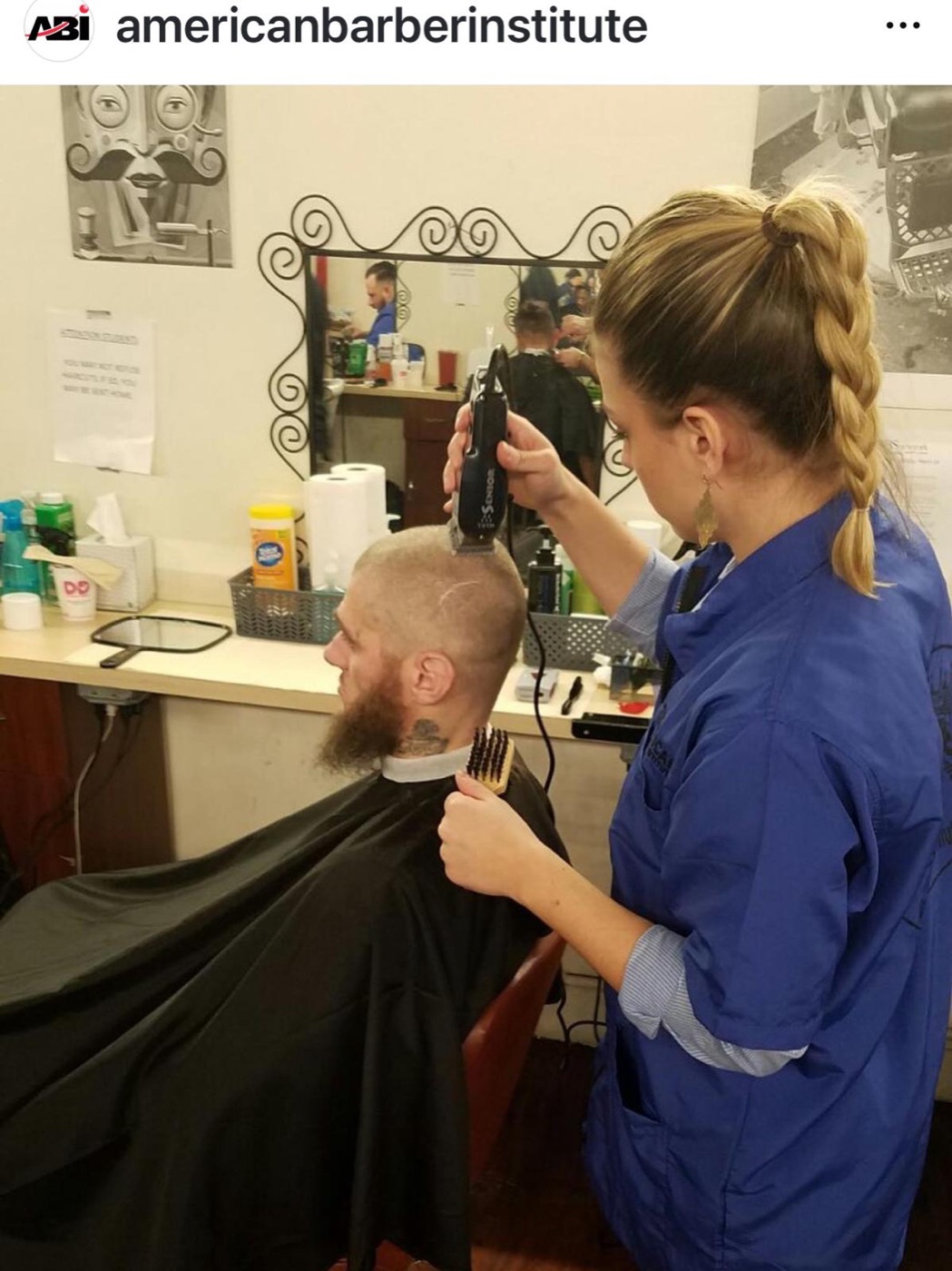 Barbering students at work in the Manhattan campus